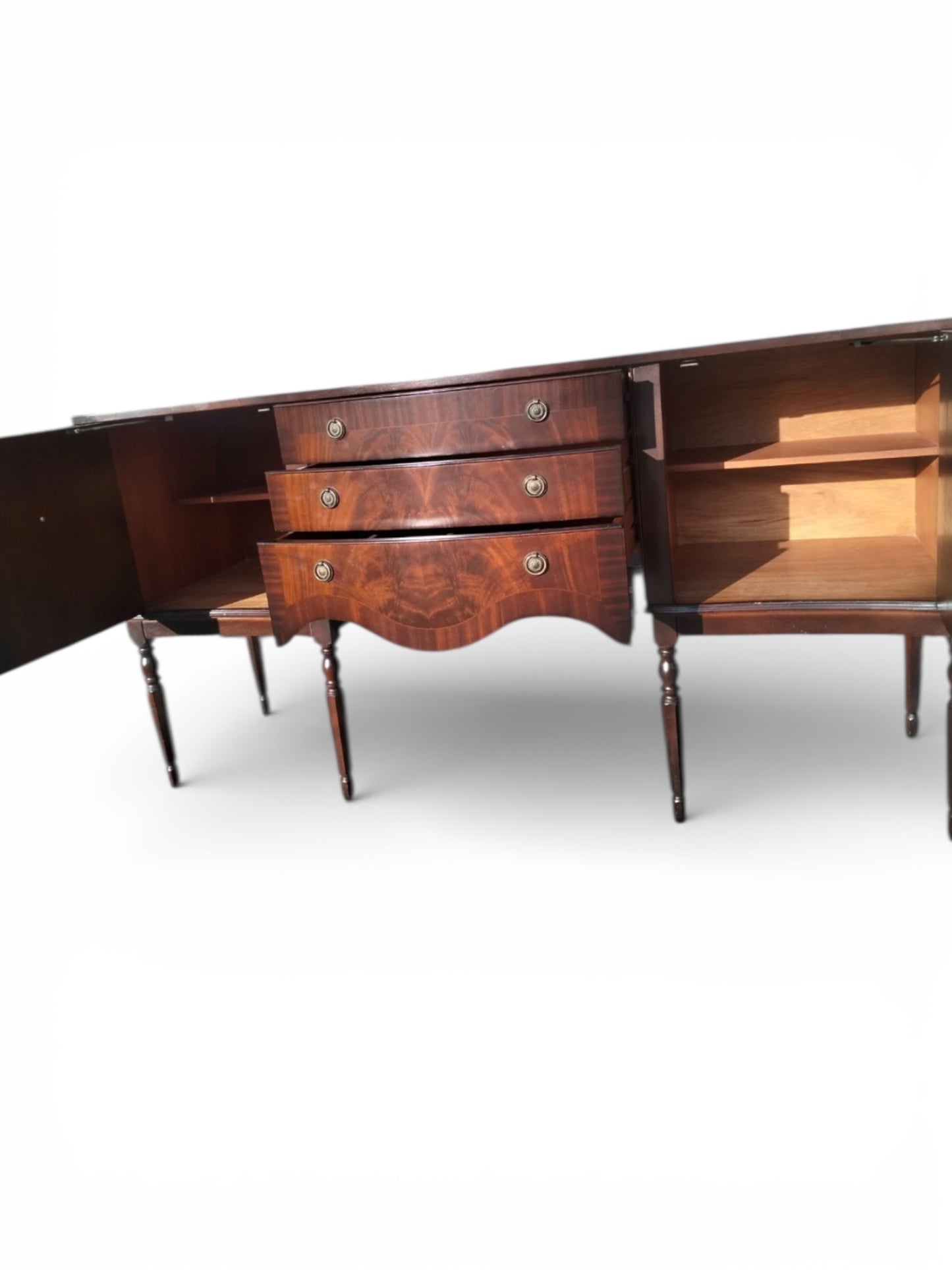 Vintage serpentine sideboard